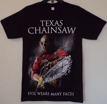 Load image into Gallery viewer, New &quot;The Texas Chain Saw Massacre - Evil Wears Many Faces&quot; Unisex Silkscreen T-Shirt. Available From Small-3XL.
