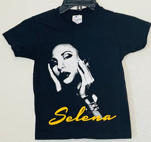 New "Selena With Yellow" Youth Silkscreen T-Shirt. Available In XS-XL Youth.