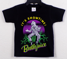 Load image into Gallery viewer, Youth-sized Beetlejuice – It&#39;s Showtime! T-shirt featuring a bold silkscreen graphic of Beetlejuice in his iconic striped suit, with the phrase &#39;It’s Showtime!&#39; printed underneath. Available in sizes XS - XL, perfect for young fans of the cult classic film.
