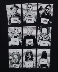 "9 Most Wanted Mugshots" Horror Unisex T-Shirt featuring black and white mugshots of iconic horror characters: Freddy Krueger, Michael Myers, Ghostface, Jason Voorhees, Pinhead, Pennywise, Chucky, Regan from The Exorcist, and Samara from The Ring. Each character is labeled with their debut year.






