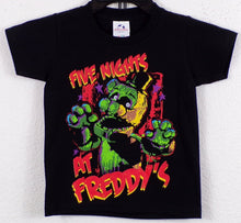 Load image into Gallery viewer, Youth T-shirt featuring Shamrock Freddy from Five Nights at Freddy’s, with a glowing green design, eerie golden eyes, and a festive shamrock hat. Available in XS-XL
