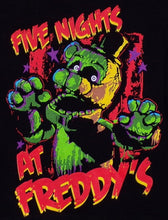 Load image into Gallery viewer, Youth T-shirt featuring Shamrock Freddy from Five Nights at Freddy’s, with a glowing green design, eerie golden eyes, and a festive shamrock hat. Available in XS-XL
