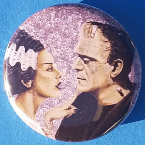 new bride of frankenstein button set of 7 fashion buttons are 1.25 inches in size Set Includes Bride of Frankenstein Bout To Kiss Bride of Frankenstein Couple In Heart Bride of Frankenstein Couple Sharing A Drink Bride of Frankenstein Front View Bride of Frankenstein Hands Over Breast Bride of Frankenstein Side View Frankenstein With Wrench tv movie horror